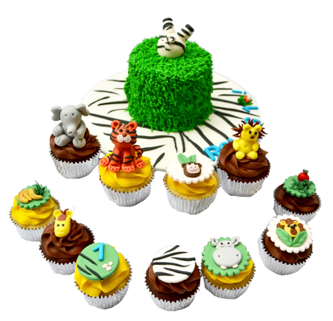 zebra into the cake cake, with animal cupcakes for a safari themed birthday sweets, cupcakes and cake with a lion cupcake, elephant cupcake, tiger cupcake, hippo cupcake by Sugar Street Boutique, toronto cakes