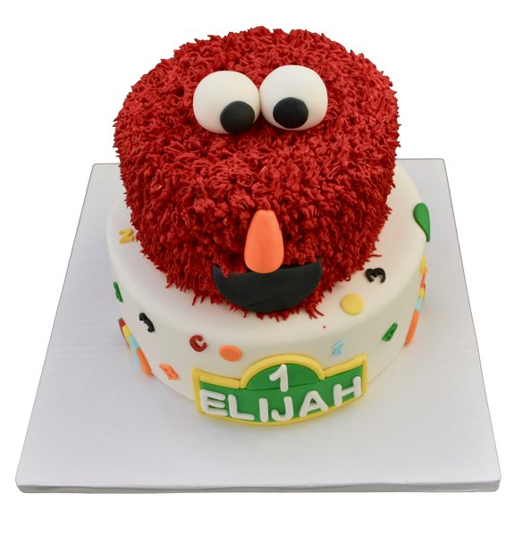 Elmo Sesame Street Chocolate cake with dulce de leche in between layers. Sesame Street cake. Sugar Street Boutique Toronto cakes.