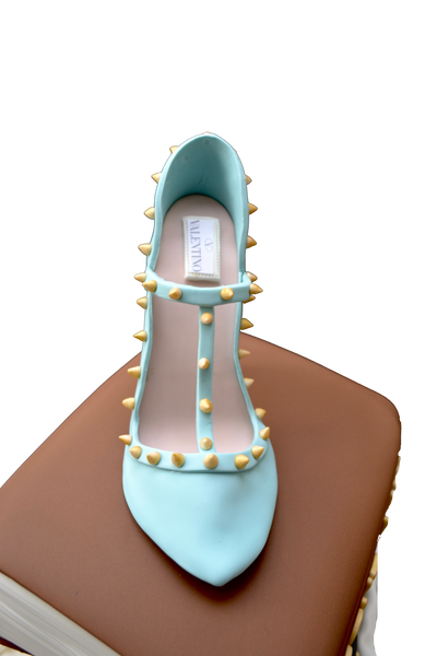 Law book cake. labour and employment law cake. edible valentino shoe. stacked books cake. sugar street boutique. toronto cakes.