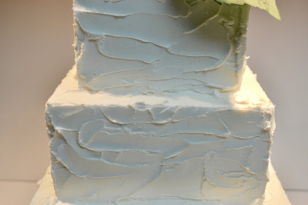 Rustic icing buttercream cake by Sugar Street Boutique Toronto perfect for weddings or birthdays.