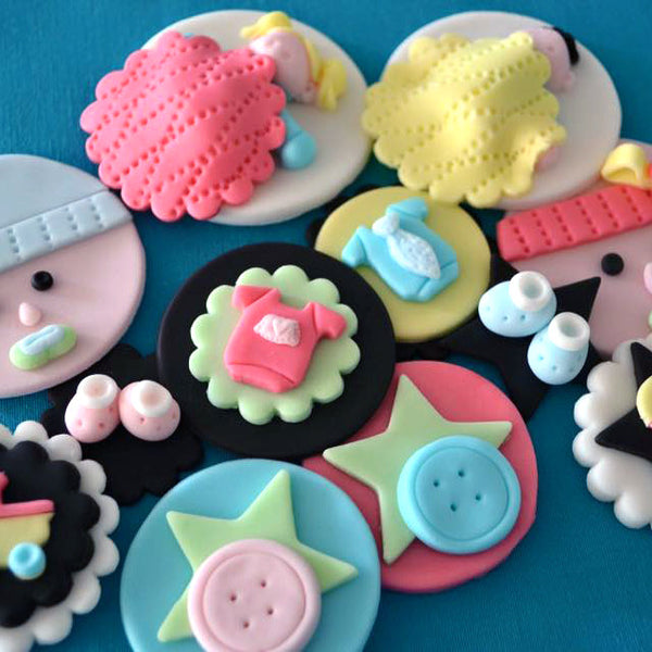 Baby Shower Themed Fondant Designs - Sugar Street Boutique by SugarStreetBoutique Custom Made Luxury Cupcake Toppers Unique Fondant Masterpiece Toronto Canada Ontario Fondant Stroller Buttons Baby Shoes Baby Onesies Sleeping Baby