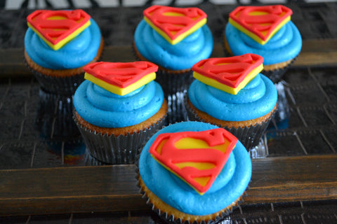 Superman Cupcake by Sugar Street Boutique. Toronto, ON Canada. Superman. Superman cupcake. Chocolate cupcake. Vanilla cupcake. superhero cupcake.