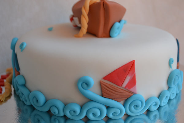 Boat cake by Sugar Street Boutique. Toronto cakes. Chocolate cake. Fondant cake. Boat sweet. Boat cake. sailor cake. one birthday cake.  fondant boat. fondant sailor. boat cake toronto. sugar street boutique. designer cake. boat.