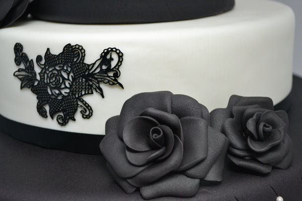 Black & White 3 Tier Wedding Cake by Sugar Street Boutique Toronto. Black roses wedding cake.