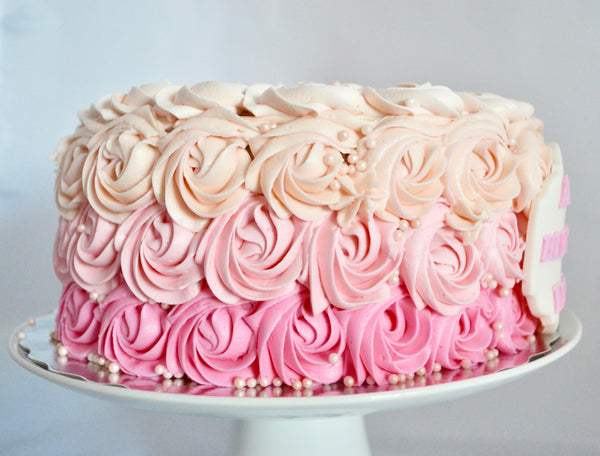 pink ombre rosette carrot cake with cream cheese icing by Sugar Street Boutique Toronto