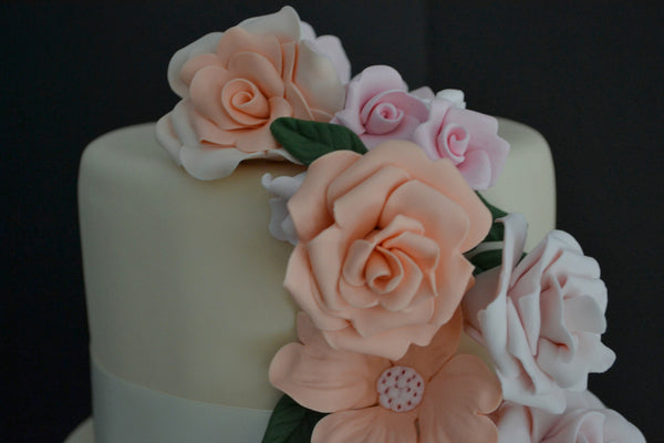 5 Tier Wedding Floral drapping Cake with soft pink and peach colors made by Sugar Street Boutique Toronto