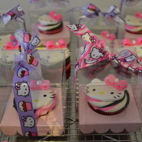 Hello Kitty Cupcakes by Sugar Street Boutique Toronto Ontario Canada Vanilla Cake HappyCake Fondant Masterpiece Colourful CupCake Luxury CupCakes Kitty Cake Cupcake in a box Hello Kitty Ribbon Boxed Cupcake TriColour Swirl Birthday Giveaways