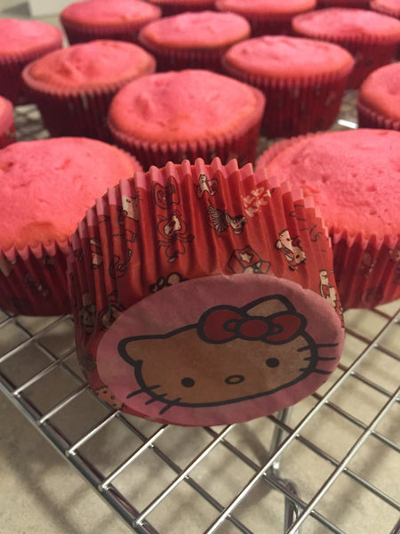 Hello Kitty Cupcakes by Sugar Street Boutique Toronto Ontario Canada Vanilla Cake HappyCake Fondant Masterpiece Colourful CupCake Luxury CupCakes Kitty Cake Cupcake in a box Hello Kitty Ribbon Boxed Cupcake TriColour Swirl Birthday Giveaways