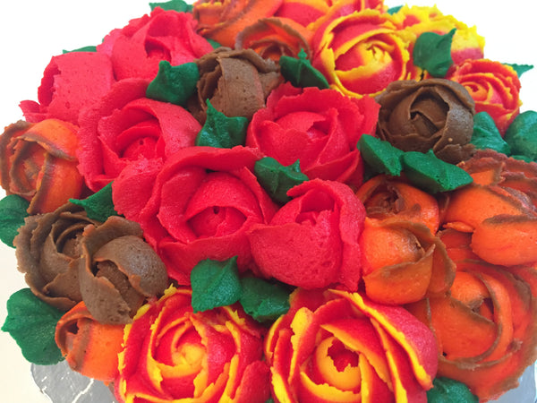 icing flower cake by sugar street boutique. sugar street boutique. icing flower cake. icing flower cake toronto. toronto cakes. lemon cake. lemon curd filling. lemon cream cheese icing. lemon flowers. cream cheese flowers. flowers cake. flowers cake toronto. designer cake. purple flowers cake. orange flowers cake. red flowers cake. colourful flower cake. fall colours cake. fall colors cake. fall cake. fall icing roses. thanksgiving cake. multicoloured icing roses. piped roses.