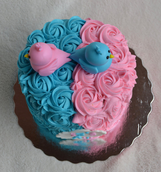 Gender reveal cake by Sugar Street Boutique Toronto. Toronto cake. Toronto cakes. gender reveal. gender reveal cake. pink or blue cake. boy or girl cake. bird cake. rosette cake. pink and blue rosettes. lemon cream cheese. lemon cake. designer cake. 