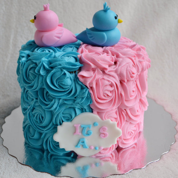 Gender reveal cake by Sugar Street Boutique Toronto. Toronto cake. Toronto cakes. gender reveal. gender reveal cake. pink or blue cake. boy or girl cake. bird cake. rosette cake. pink and blue rosettes. lemon cream cheese. lemon cake. designer cake. 