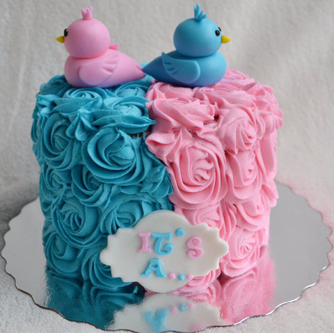 Gender reveal cake by Sugar Street Boutique Toronto. Toronto cake. Toronto cakes. gender reveal. gender reveal cake. pink or blue cake. boy or girl cake. bird cake. rosette cake. pink and blue rosettes. lemon cream cheese. lemon cake. designer cake. 