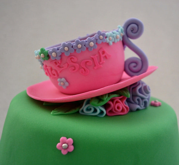 Alice in Wonderland Mad Hatter Cake by Sugar Street Boutique Toronto Ontario Canada Vanilla Cake HappyCake Fondant Masterpiece Luxury Cake  Teacup cake hat cake Colourful Cake Kids Cake Cute Cake Girl Cakes