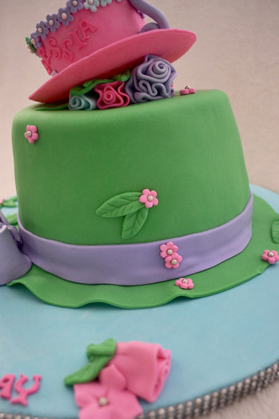 Alice in Wonderland Mad Hatter Cake by Sugar Street Boutique Toronto Ontario Canada Vanilla Cake HappyCake Fondant Masterpiece Luxury Cake  Teacup cake hat cake Colourful Cake Kids Cake Cute Cake Girl Cakes