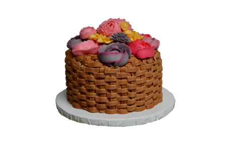Carrot cake with cream cheese icing decorated with yellow, pink, grey flowers and roses and basket icing by Sugar Street Boutique Toronto