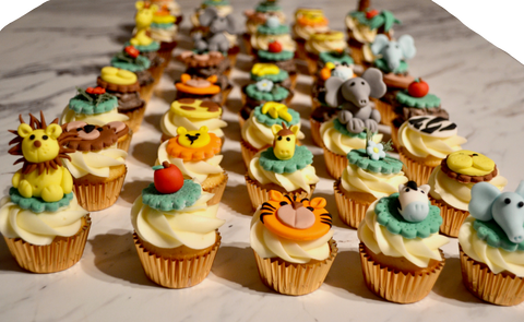 animals baby shower cupcakes. baby shower cupcakes. cupcakes toronto. best cupcakes toronto. lion cupcake. zebra cupcake. flower cupcake. elephant cupcake. sugar street boutique.