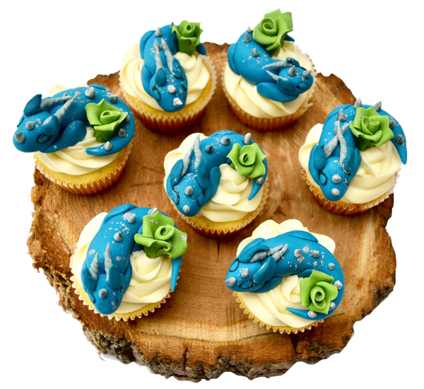 Vanilla cupcakes with fondant edible dragons by sugar street boutique toronto