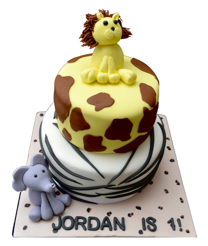 Animal print chocolate & lemon cake with an edible elephant & lion. sugar street boutique. toronto cakes. edible lion. edible elephant, giraffe animal print cake, zebra animal print cake.