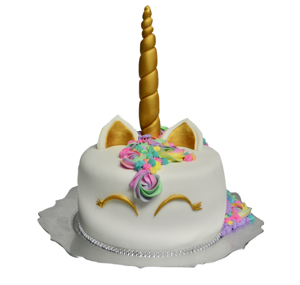 Unicorn chocolate cake covered with fondant and decorated with icing flowers rosettes by sugar street boutique, toronto