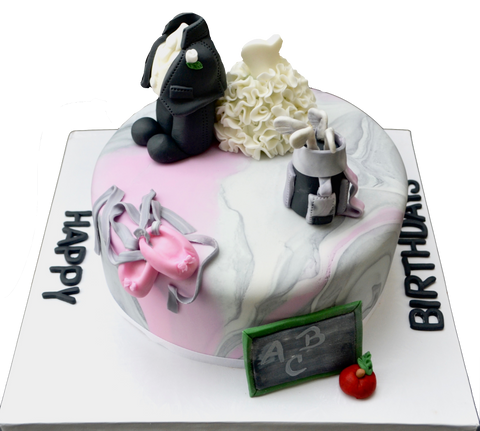 5 birthdays 1 chocolate cake. everyones birthday cake. edible ballerina slippers, edible chalk board. school cake, edible bride and groom. bride and groom cake. golf clubs cake. edible gold clubs. Sugar street boutique. toronto cakes.