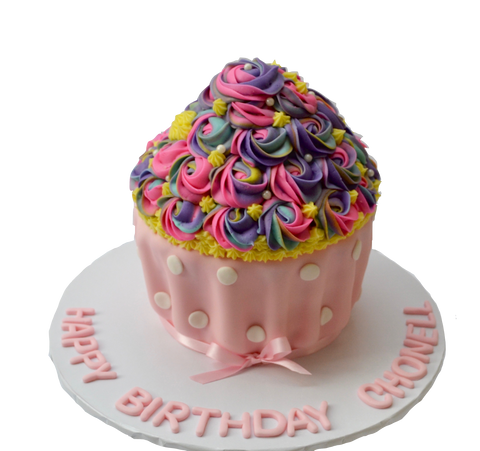 giant vanilla cupcake cake topped with icing coloured rosettes by sugar street boutique toronto cakes