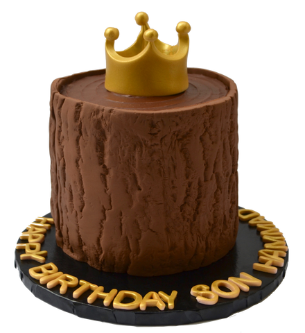 tree trunk cake with a gold edible crown on top, chocolate cake for a birthday by sugar street boutique toronto cakes