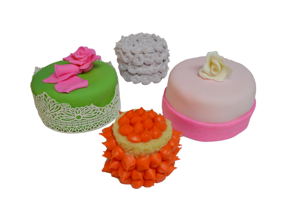 bright colours mini cakes with rosettes, edible lace, icing and edible flowers and fondant by Sugar Street Boutique