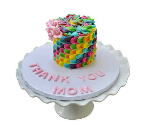 colourful rainbow with rosettes carrot cake perfect for mothers day or any occasion decorated with edible fondant pink roses by Sugar Street Boutique Toronto