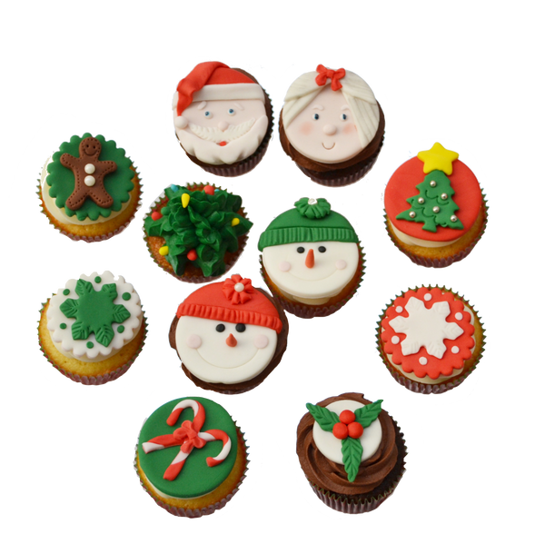Christmas cupcakes toronto with snowman cupcakes toppers, christmas tree cupcake toppers, ms.claus and santa cupcakes toppers, gingerbread man cupcakes topper and a snowflake cupcake topper by sugar street boutique toronto