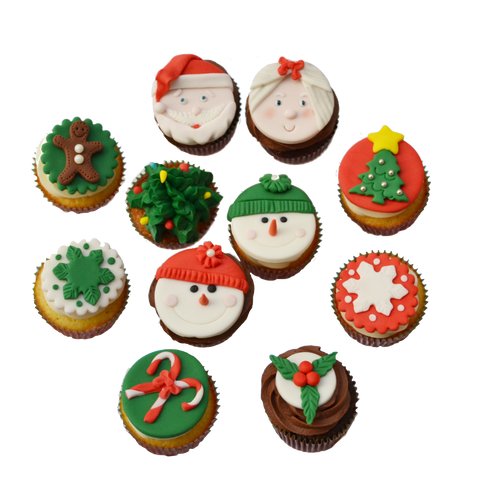 Christmas cupcakes toronto with snowman cupcakes toppers, christmas tree cupcake toppers, ms.claus and santa cupcakes toppers, gingerbread man cupcakes topper and a snowflake cupcake topper by sugar street boutique toronto