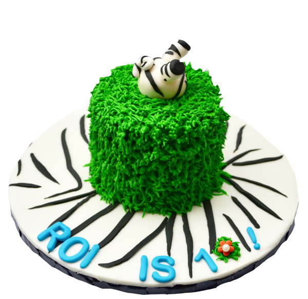 zebra into the cake cake, with animal cupcakes for a safari themed birthday sweets, cupcakes and cake with a lion cupcake, elephant cupcake, tiger cupcake, hippo cupcake by Sugar Street Boutique, toronto cakes