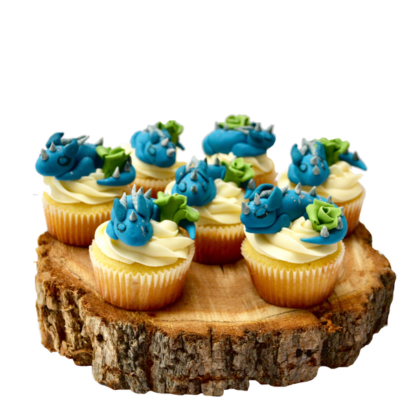 Vanilla cupcakes with fondant edible dragons by sugar street boutique toronto