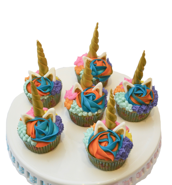 unicorn cupcakes. toronto cupcakes. sugar street boutique. multicoloured cupcakes. edible unicorn. unicorn cupcake toppers. 
