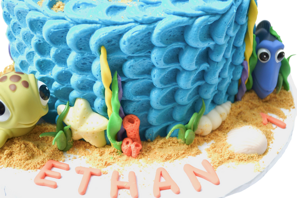 Finding Nemo Chocolate Cake with blue icing, orange demo for a 1 year old finding memo birthday party by Sugar Street Boutique Cakes Toronto