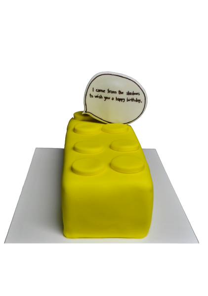 Lego cake with batman shape on the inside cake made of chocolate and vanilla and covered in fondant by Sugar Street Boutique