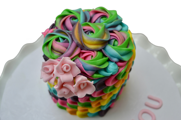 colourful rainbow with rosettes carrot cake perfect for mothers day or any occasion decorated with edible fondant pink roses by Sugar Street Boutique Toronto