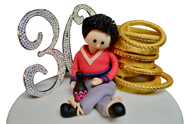 30th chocolate birthday cake fully customized with love bracelets that look like the cartier bangles and edible gold sequin for #AngelinoOnTheGo made by Sugar Street Boutique, Toronto.