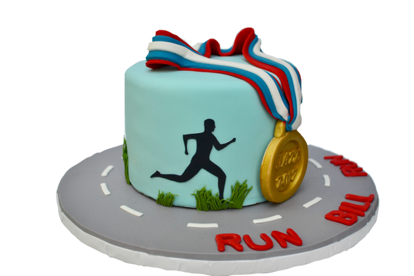 jazz run toronto marathon 2017 cake with a gold medal, the toronto skyline and a running man, run bill run. Vanilla cake with chocolate icing by sugar street boutique toronto.