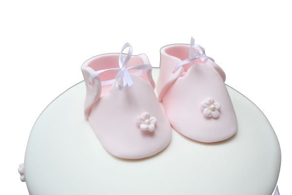 baptism/christnening cake. baby shower cake. 2 tier cake. blush baby girl cake. pink baby booties cakes. sugar street boutique toronto cakes.