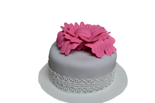 Mini cakes, individually sized, red velvet mini cake, chocolate mini cake, lemon mini cake and vanilla mini cake decorated with edible flowers, small icing rosettes with spring colours by Sugar Street Boutique