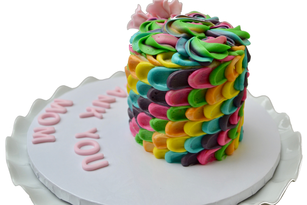 colourful rainbow with rosettes carrot cake perfect for mothers day or any occasion decorated with edible fondant pink roses by Sugar Street Boutique Toronto
