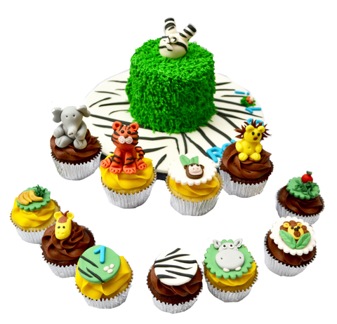 zebra into the cake cake, with animal cupcakes for a safari themed birthday sweets, cupcakes and cake with a lion cupcake, elephant cupcake, tiger cupcake, hippo cupcake by Sugar Street Boutique, toronto cakes