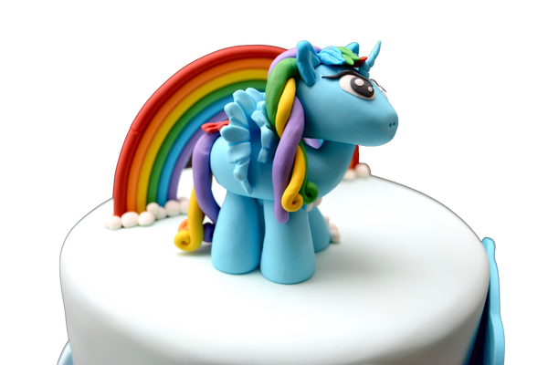 My Little Pony Cake. A rich and super moist 3 layer chocolate cake with chocolate icing in between layers. Edible my little pony. Sugar Street Boutique. Toronto Cakes. Rainbow Cake.