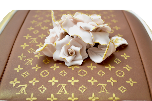 Louis Vuitton trunk cake. Chocolate cake. toronto cakes. edible louis vuitton cake, edible flowers, edible gold. Sugar Street Boutique. Louis Vuitton monogram.
