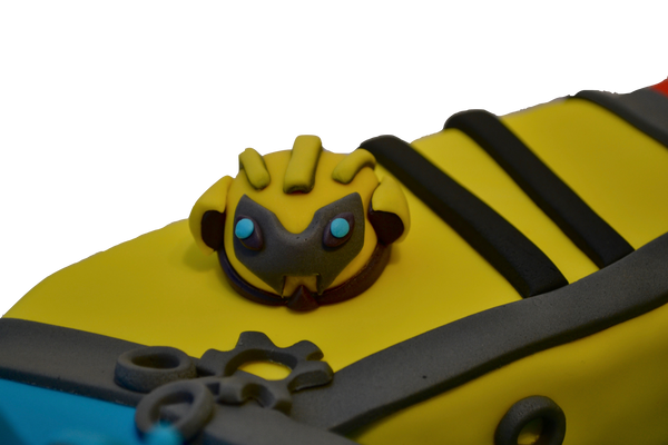 rescue bots transformers cake shaped in the number 4 cake, made of vanilla with dulce de leche by Sugar Street Boutique Toronto Cakes.