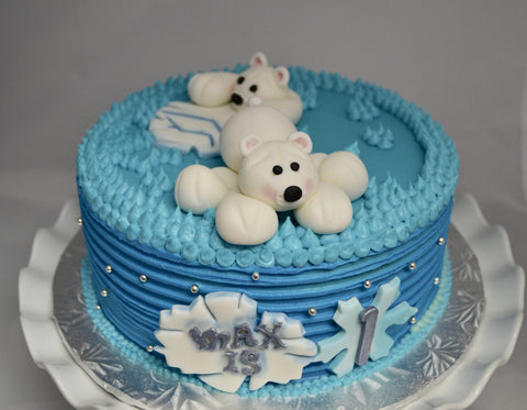 Vanilla Polar Bear Birthday Cake decorated with cream cheese icing and fondant polar bears by Sugar Street Boutique Toronto