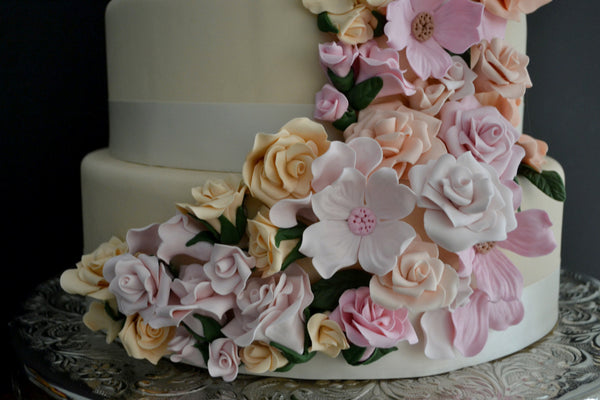 5 Tier Wedding Floral drapping Cake with soft pink and peach colors made by Sugar Street Boutique Toronto