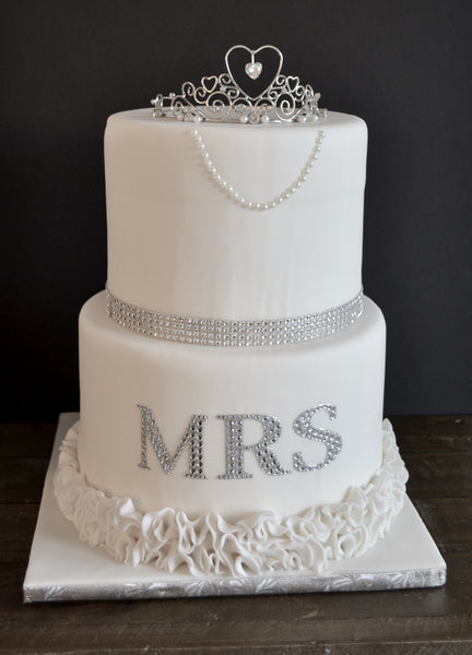 Mr. & Mrs. Wedding cake made by Sugar Street Boutique. His and hers cake, bride and groom wedding cake. Toronto