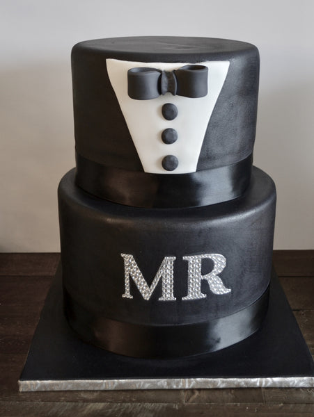 Mr. & Mrs. Wedding cake made by Sugar Street Boutique. His and hers cake, bride and groom wedding cake. Toronto