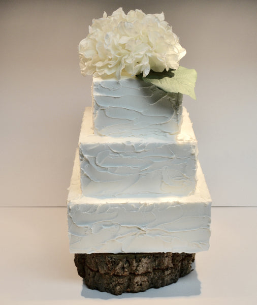 Rustic icing buttercream cake by Sugar Street Boutique Toronto perfect for weddings or birthdays.